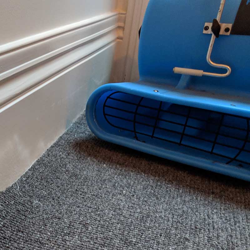 Air blower drying wet carpets in Melbourne CBD